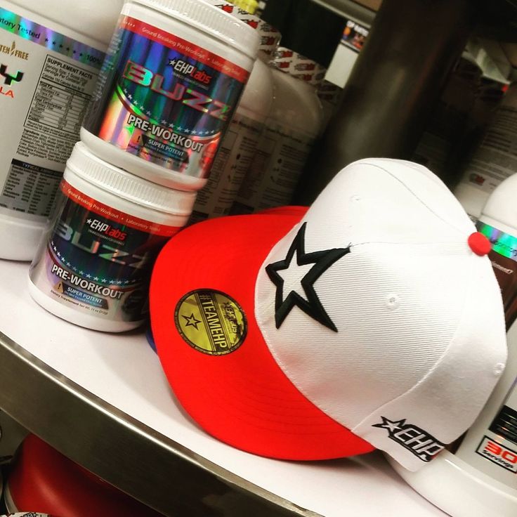 EHPlabs Buzz pre-workout and an EHP snapback on the Xplosiv shelf, 2015